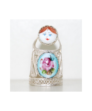 Enameled doll in silver