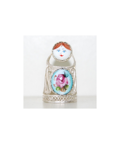 Enameled doll in silver